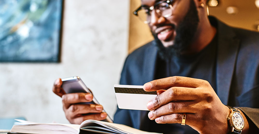 businessman making a mobile payment transaction on a smartphone